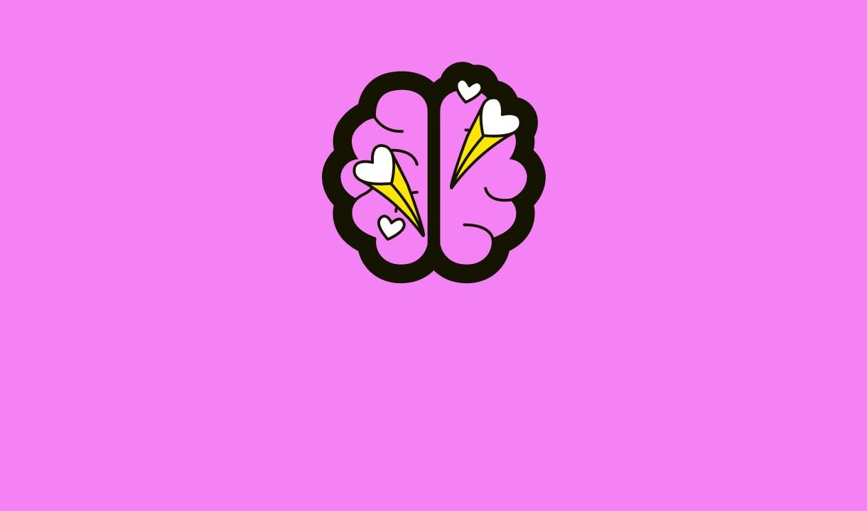 Cérebro rosa e corações sobre fundo rosa